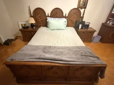 A true vintage bedroom classic. Includes queen size headboard & footboard with rails, two-piece armo...