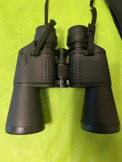 In very good condition, optics good, neck strap, lens cleaning cloth, and storage bag Curbside picku...