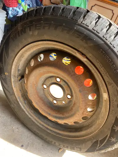 Studded winter tires on steel rims came off a 2007 Nissan versa used one season pretty much brand ne...