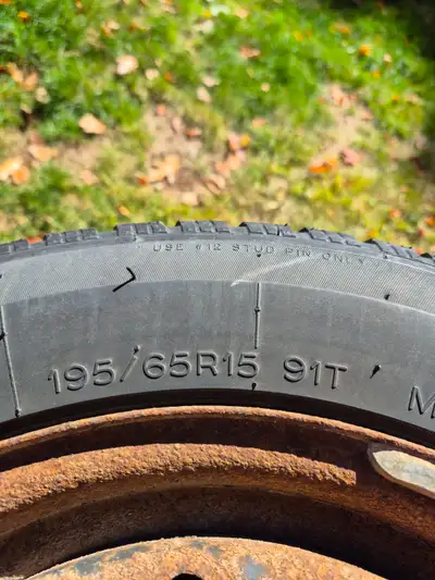Four 195/65R15 Uniroyal Tiger Paw snow tires. Used two winters, less than 5000 on them. Mounted on r...