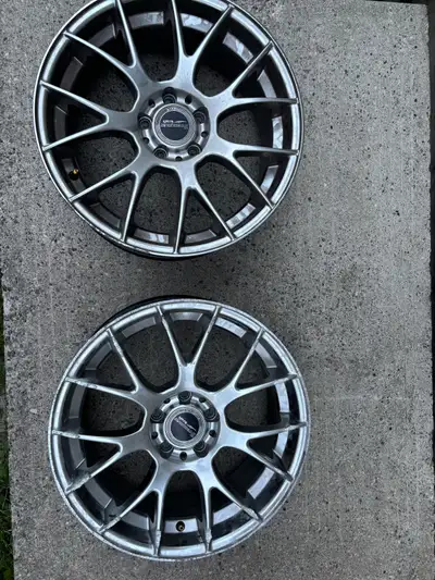 Four 18” rims . 2 are scratched up some from curb side as seen in photo , but the price reflects . T...