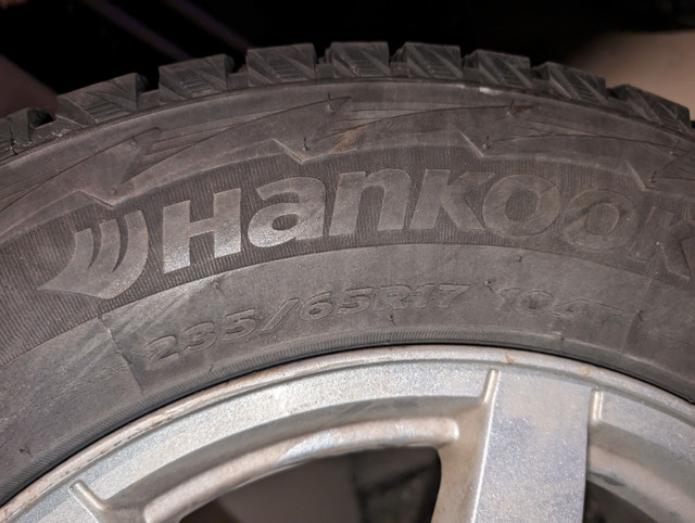 Four Studded Winter Tires on Cadillac Rims - Hankook 235/65-R17 in Tires & Rims in Strathcona County - Image 3
