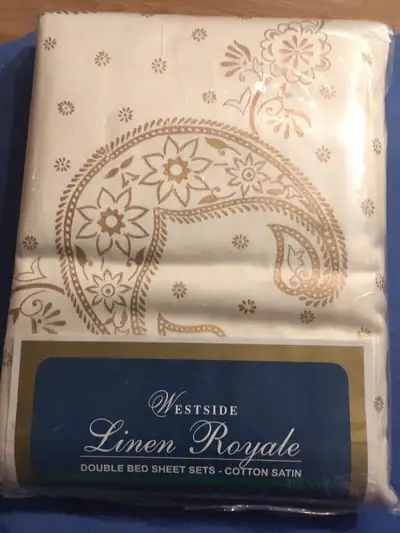 3 piece bed sheets and 2 pillow cases still sealed. Cotton Satin