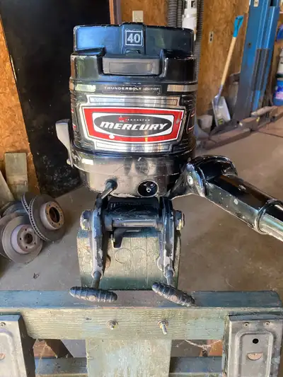 mercury 4hp outboard comes with gas tank needs carb cleaning kept inside was running well call 70574...