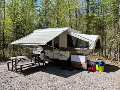 Key Features: Sleeping Capacity: Comfortably sleeps up to 7 with front queen-size and rear full-size...