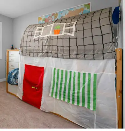 Very good condition..IKEA riversible twin bed comes with firm mattress and canopy.