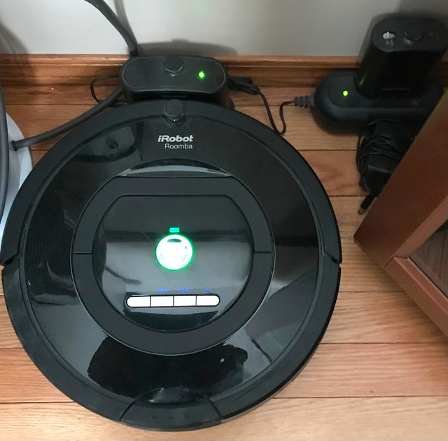 IRobot Roomba, a robotic home cleaner in Vacuums in Calgary