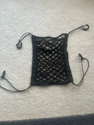 I have a black car seat organizer with 2 pockets for sale! It's in a great condition and measures ap...