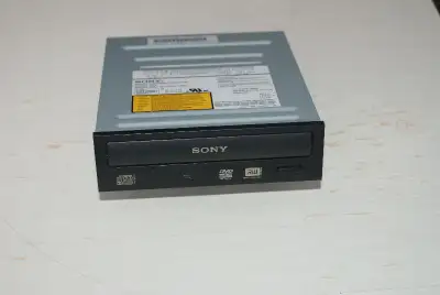 Used Sony DVD/CD Rewritable Drive, Model DRU-120C, IDE connections, in good working condition. Black...