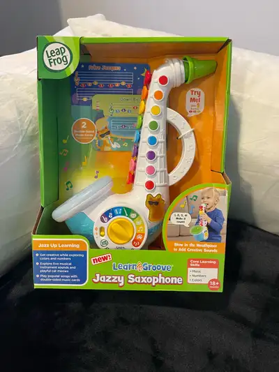Introducing the LeapFrog Learn and Groove Jazzy Saxophone, a musical toy designed to introduce child...