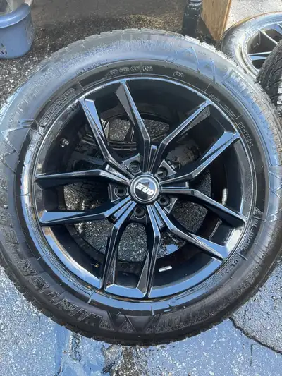 18" Alloy rims from EVO including Ford TPMS sensors Motomaster winter tires 235/65 R18 approx 4 year...