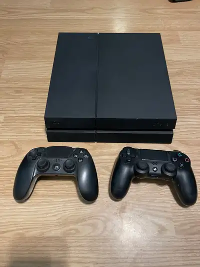 Factory reset 500GB PS4. Works great. Two controllers; both of them are third party but work fine. I...