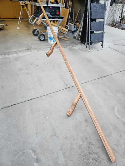 12 foot 4inch long oak handrail with oak wall mount brackets.