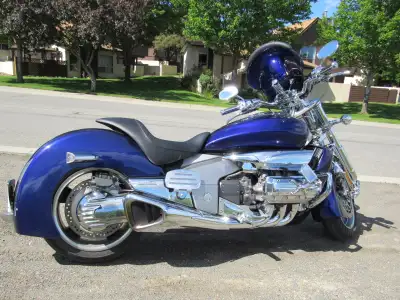 Rare collector bike with low miles. Includes solo and 2-up saddles, Corbin beavertail windscreen, ba...