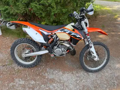 Mint condition 2014 KTM 200 XCW, runs like the woods weapon it was designed to be. Lowered 1in but c...