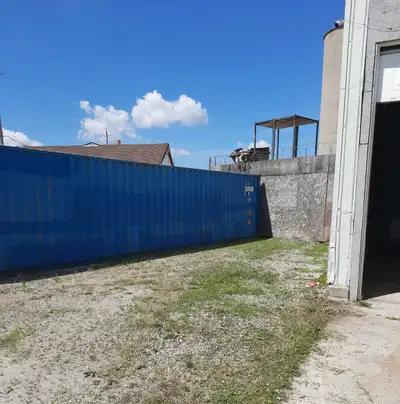 Outside compound with secured fencing available for rent. In the area of Highbury Avenue and Trafalg...