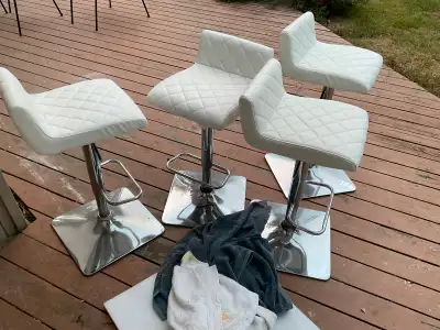 4 stylish bar stools totaling 100, View more