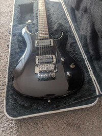 Ibanez Joe Satriani model guitar and molded case