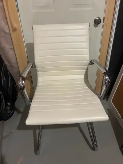 2 white office chairs, View more