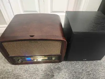 This unit has AM FM radio record player CD player USB player also a powered subwoofer to make this f...