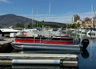 Beautiful 2023 South Bay 224RSLE Tritoon pontoon in Black Onyx / Victory Red with only ~57 hours on...