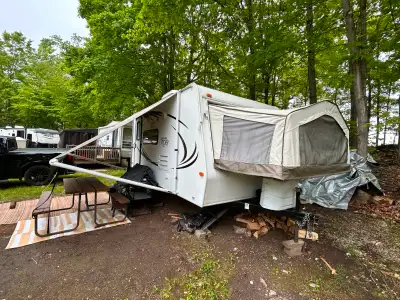 For Sale: 2010 Rockwood Signature Ultra Lite RLT17ROO. Cozy double bed-slide travel trailer with a c...