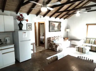 solid, cute, rustic and clean cottage just on the edge of town..2km to main street. town water & sew...