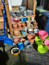 Assorted clay pots ... also metal .. plastic   ..... Runnymede s