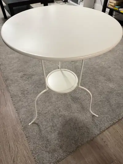 White round bedside IKEA table, View more