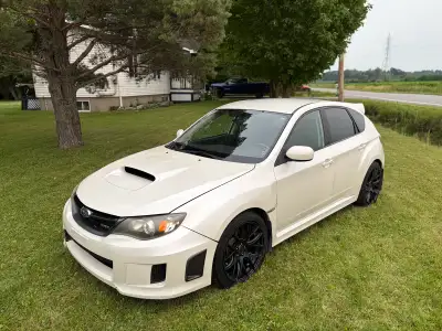 Subaru WRX 2011 KM : 218490 - Moteur 2.5L turbo ( Moteur changé le mois passé pour un de 180k kilo )...