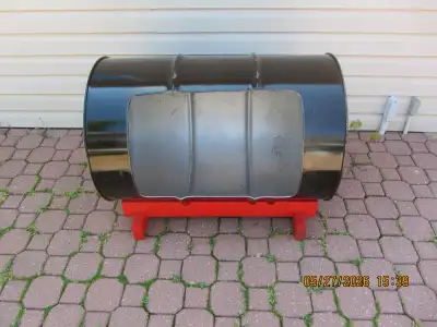Dog house. 45 gallon drum modified to dog house. In excellant condition. As per photos. $60