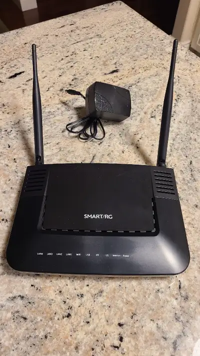 Smart/RG SR804N cable modem with integrated WiFi router. Works well.