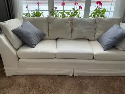 Upholstery cream color couch., View more