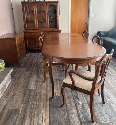 Solid wood Gibbard dining room set with hutch and buffet. Table has 2 leafs and 6 chairs. Set also i...