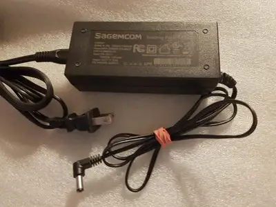 Sagemcom Switching Power Adpter 12.0V 5.0A input 100-120V. 50/60Hz~1.5A output 12.0V~5.0A Color: Bla...