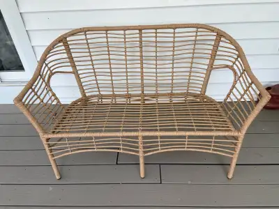 Wicker loveseat 48.5”w 31.5” high at back