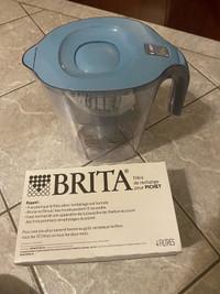 Brita Lake water filtration pitcher with 9 new filters.