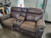 Love seat recliner in great working order  alittle faded