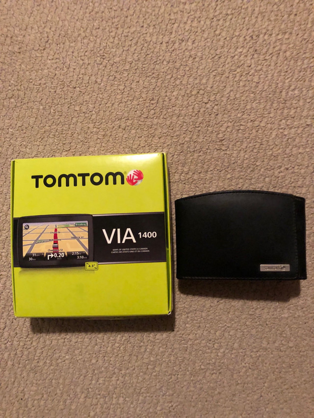 TOMTOM VIA 1400 GPS (Travel case included) in General Electronics in City of Toronto