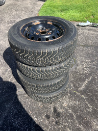 Set of Camry rims ( tires hold air)