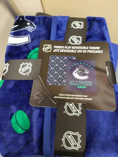 Canucks reversible throw Blanket- BRAND NEW, View more