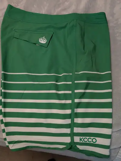 Two pairs of board shorts perfect for holidays, swimming. One is from The Chive (size 38 or XL). Gre...