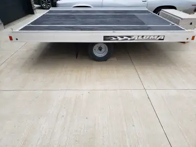 2014 Aluma 8610T (tilt) All aluminum frame Treated plywood deck (8.5'X10') Torflex suspension Swivel...