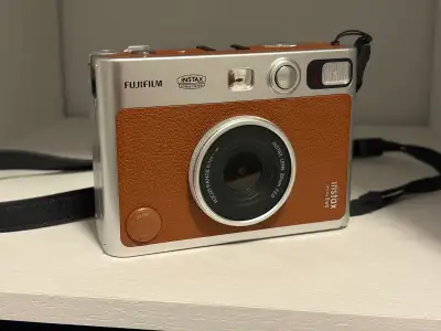 Digital & Polaroid Camera | FujiFilm Mini Evo, View more