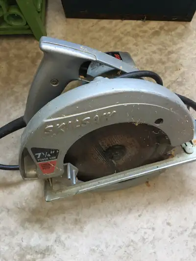 71/4" Skill circular saw and Black and Decker electric drill, View more