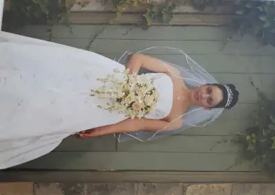 Off the shoulder A line gown and veil. Bead work throughout dress and trane. Excellent condition and...