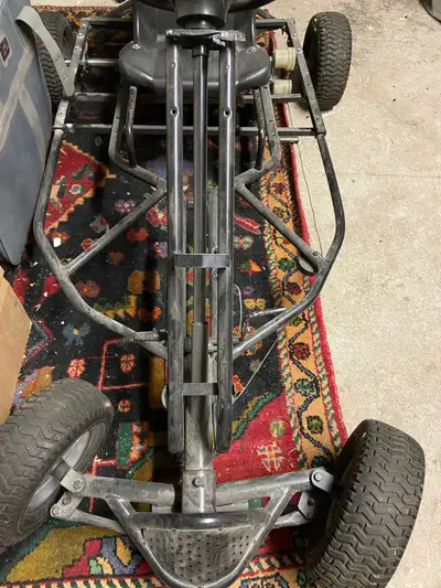 Get ready to zoom around with this go-kart! It has a sturdy frame, a powerful engine, and four rugge...