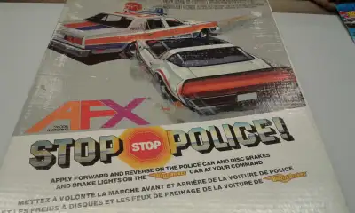 Vintage AFX "Stop Police!"  RARE Slot Car Set., View more