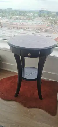 Black wooden side table w/ drawer.