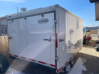 Enclosed sled trailer
